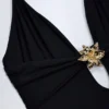 Bañador Bahari con aberturas y detalles metálicos en negro