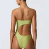 Bañador bandeau con aberturas y adornos de abalorios Miami en verde pera