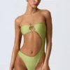 Bañador bandeau con aberturas y adornos de abalorios Miami en verde pera