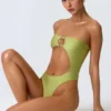 Bañador bandeau con aberturas y adornos de abalorios Miami en verde pera