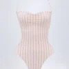 Bañador Biarritz con escote halter y aberturas en malva