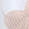 Bañador Biarritz con escote halter y aberturas en malva