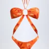 Bañador halter con aberturas Maranta en estampado de orquídeas naranjas