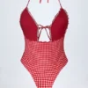 Bañador halter con volantes y aberturas Montjoi en cuadros rojos