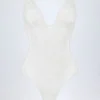 Bodis de encaje transparente con escote pronunciado y bordes festoneados Zayla en blanco