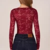 Bodis de manga larga con encaje Letizia en rojo cereza