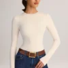 Bodis de manga larga y cuello redondo Ziva Modal en color crema