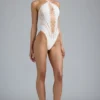 Bodis de verano con cuello halter y cordones en color marfil