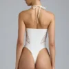Bodis de verano con cuello halter y cordones en color marfil