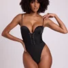 Body corsé de satén con escote pronunciado y cordones Yelda en negro