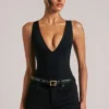 Body Rumi con escote profundo y cuello halter en negro