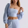 Bolero corto con capucha de jersey cepillado en azul suave
