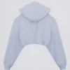 Bolero corto con capucha de jersey cepillado en azul suave
