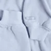 Bolero corto con capucha de jersey cepillado en azul suave