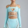 Bolero corto Pixie con adornos en azul hielo