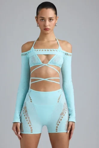 Bolero corto Pixie con adornos en azul hielo
