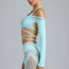 Bolero corto Pixie con adornos en azul hielo