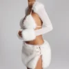 Bolero Vira con ribete de piel sintética en blanco