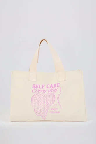 Bolso tote oversize de lona en color cáscara de huevo