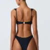 Braguitas de bikini atrevidas con adornos Volute en negro