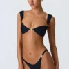 Braguitas de bikini atrevidas con adornos Volute en negro