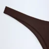 Braguitas de bikini cheeky de corte alto Manea en color chocolate oscuro