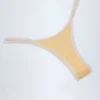 Braguitas de bikini cheeky de Masia con doble tirante en cuadros amarillos