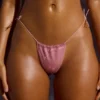 Braguitas de bikini con cordón y adornos en rosa