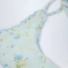 Braguitas de bikini tanga con lazos laterales Nieva en estampado floral azul