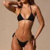 Braguitas de bikini tanga con lazos laterales Serina en negro