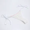 Braguitas de bikini tanga con lazos laterales Vernazza en blanco con bordado inglés