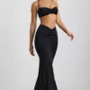 Bralette de jersey elástico con detalle de herrajes y cuello halter Jerika en negro