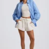 Camisa oversize de popelín de algodón a rayas en azul