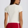 Camiseta corta con estampado en color marfil