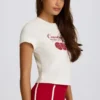 Camiseta corta con estampado en color marfil