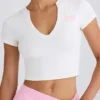 Camiseta corta de jersey de algodón elástico con estampado gráfico en blanco