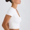 Camiseta corta de jersey de algodón elástico con estampado gráfico en blanco