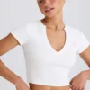 Camiseta corta de jersey de algodón elástico con estampado gráfico en blanco