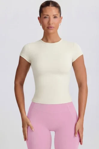 Camiseta larga con aberturas en color crema