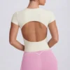 Camiseta larga con aberturas en color crema