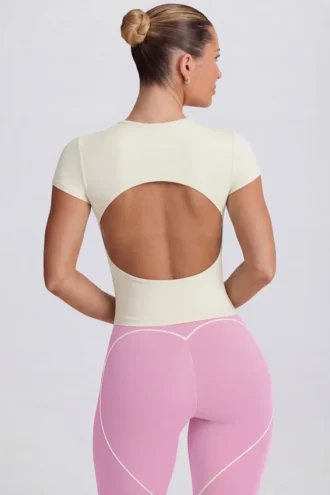 Camiseta larga con aberturas en color crema