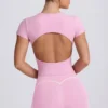 Camiseta larga con corte en rosa empolvado