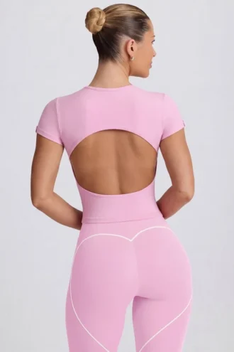 Camiseta larga con corte en rosa empolvado