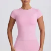 Camiseta larga con corte en rosa empolvado