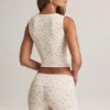 Camiseta sin mangas con botones de modal acanalado Lene en estampado floral