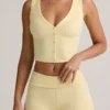 Camiseta sin mangas con botones y canalé de modal Lene en amarillo crema