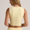 Camiseta sin mangas con botones y canalé de modal Lene en amarillo crema