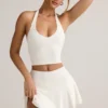 Camiseta sin mangas con cuello halter Kori de modal en blanco