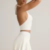 Camiseta sin mangas con cuello halter Kori de modal en blanco