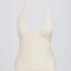 Camiseta sin mangas con cuello halter y espalda abierta en marfil jaspeado